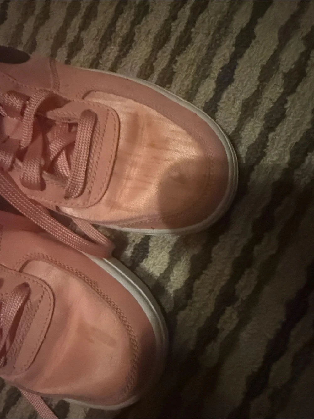 Nike Pink Low-Top Sneakers with Black Swoosh